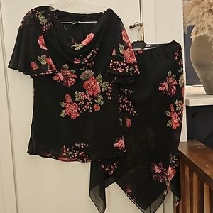 Eva blue size 10 handkerchief style skirt black and rose dress